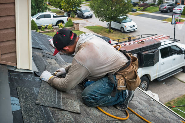Professional Roofing technician working in Utica, NY